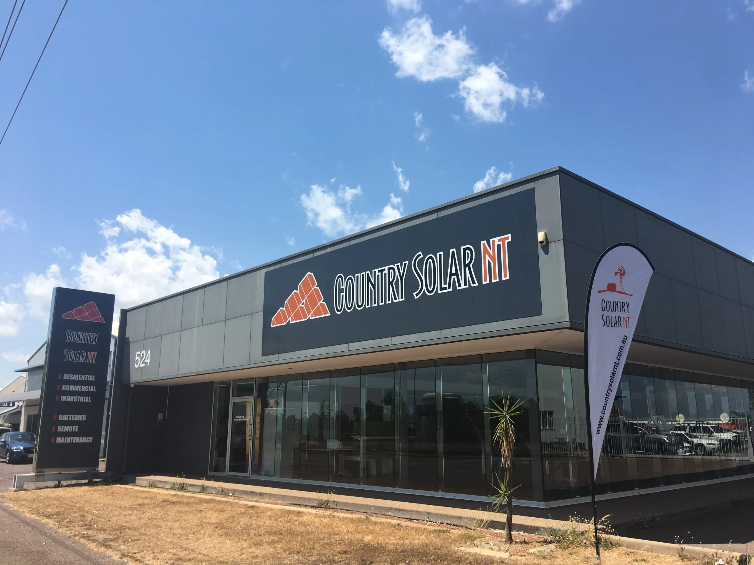 Large-scale solar panel installation across commercial rooftop